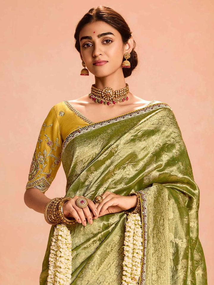 Delightful Green Zari Weaving Silk Mehendi Wear Saree With Blouse