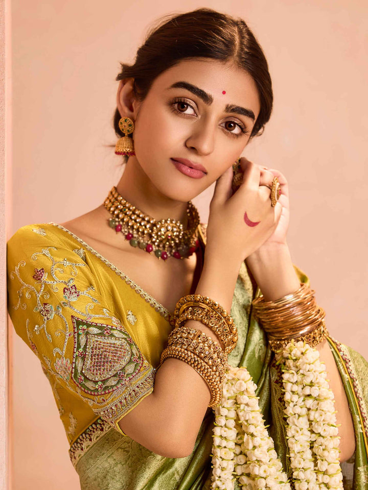Delightful Green Zari Weaving Silk Mehendi Wear Saree With Blouse
