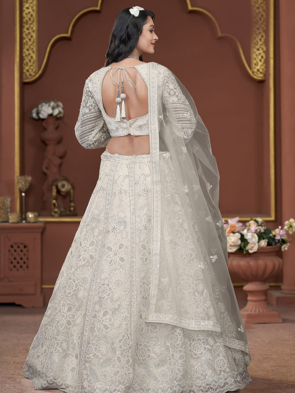 Adorable Off-White Sequins Net Engagement Wear Lehenga Choli