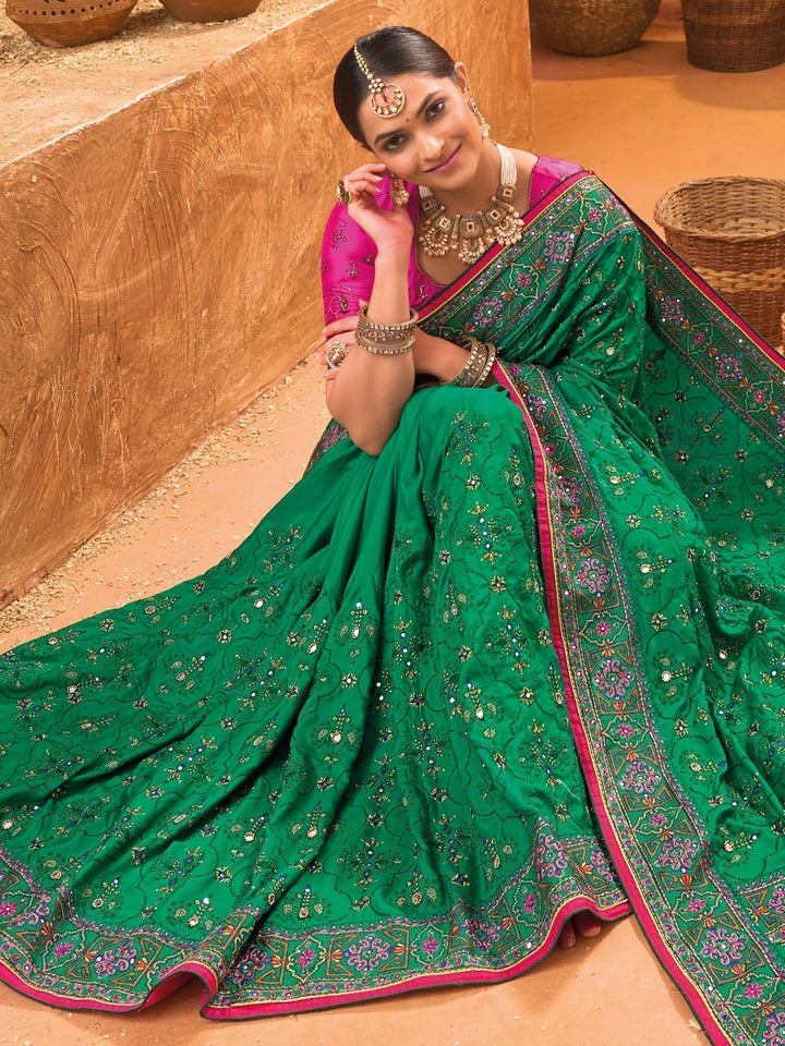 Shop Enticing Green Mirror Work Banarasi Silk Saree with Blouse