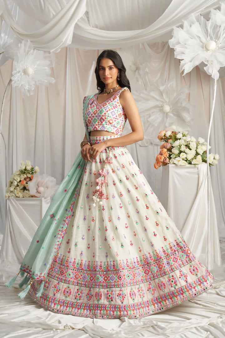 Shop off-white organza lehenga with intricate embroidery work