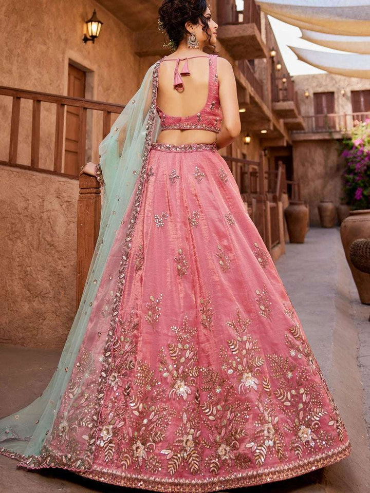 Stonework dusty pink bridal lehenga