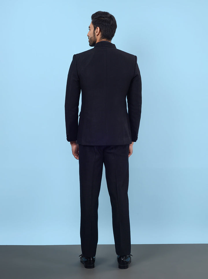 Tailored for the modern man, this black Jodhpuri suit ensures you stand out at any event.
