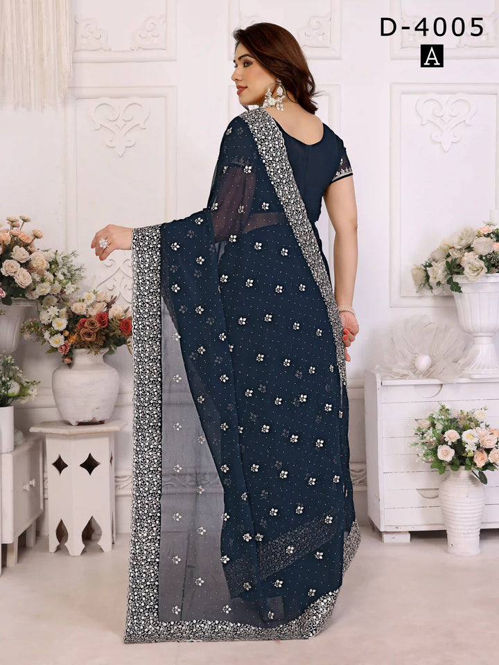 Teal Blue Georgette Saree with Zari & Stone Embellishments 

