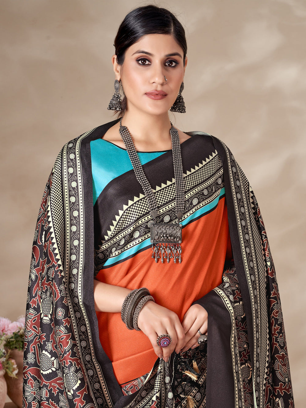 Trendy orange Pashmina saree for event wear