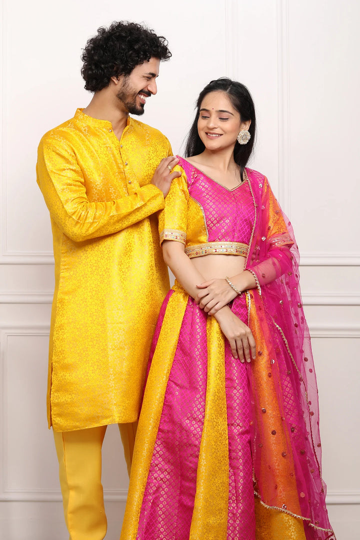 Fuchsia and Amber Brocade Lehenga Choli with Matching Kurta Pyjama Couple Set