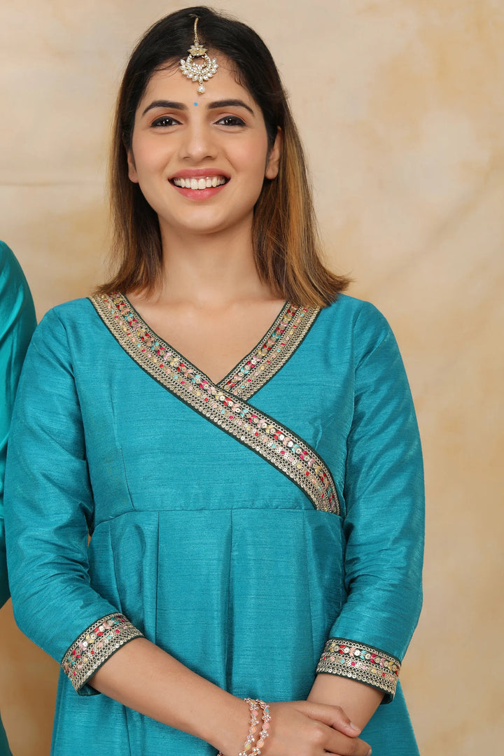 Exquisite Peacock Blue Ethnic Silk Gown with Matching Kurta Pyjama Couple Set