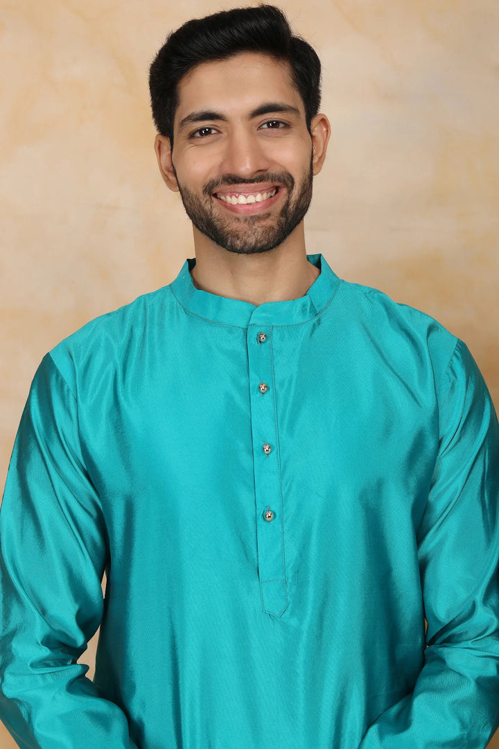 Exquisite Peacock Blue Ethnic Silk Gown with Matching Kurta Pyjama Couple Set
