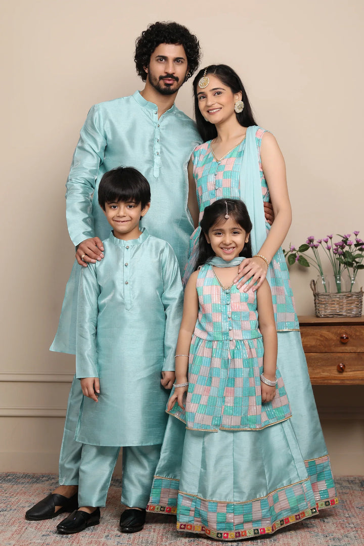 Shining Aqua Blue Lehenga and Peplum Top Set With Matching Kurta Pyjama for Family