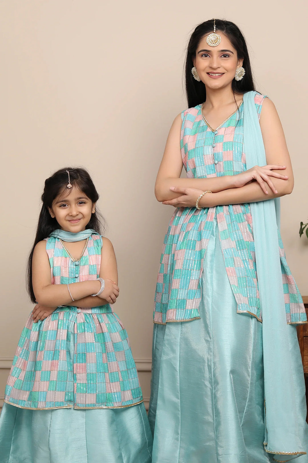 Shining Aqua Blue Lehenga and Peplum Top Set With Matching Kurta Pyjama for Family