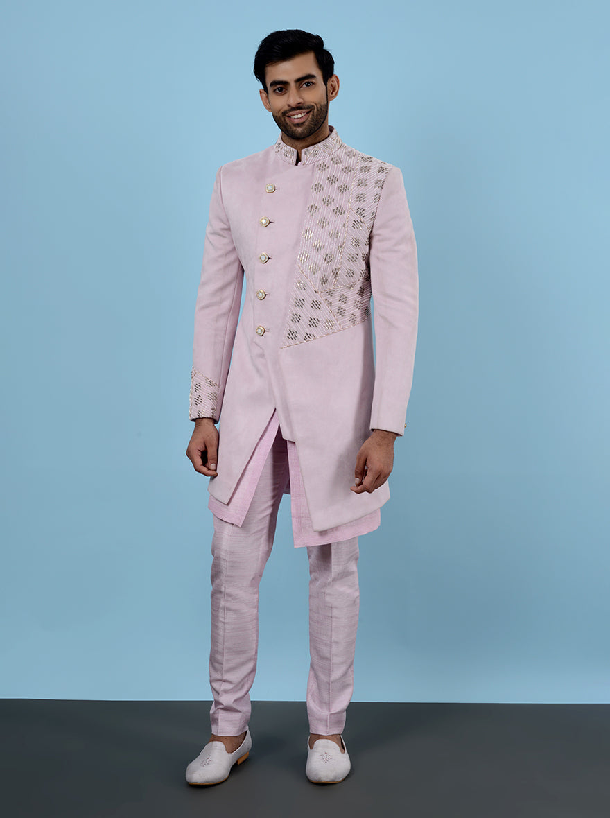 Classic pink suede men’s outfit, embroidered for traditional events