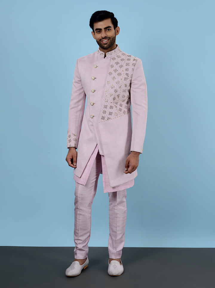 Classic pink suede men’s outfit, embroidered for traditional events