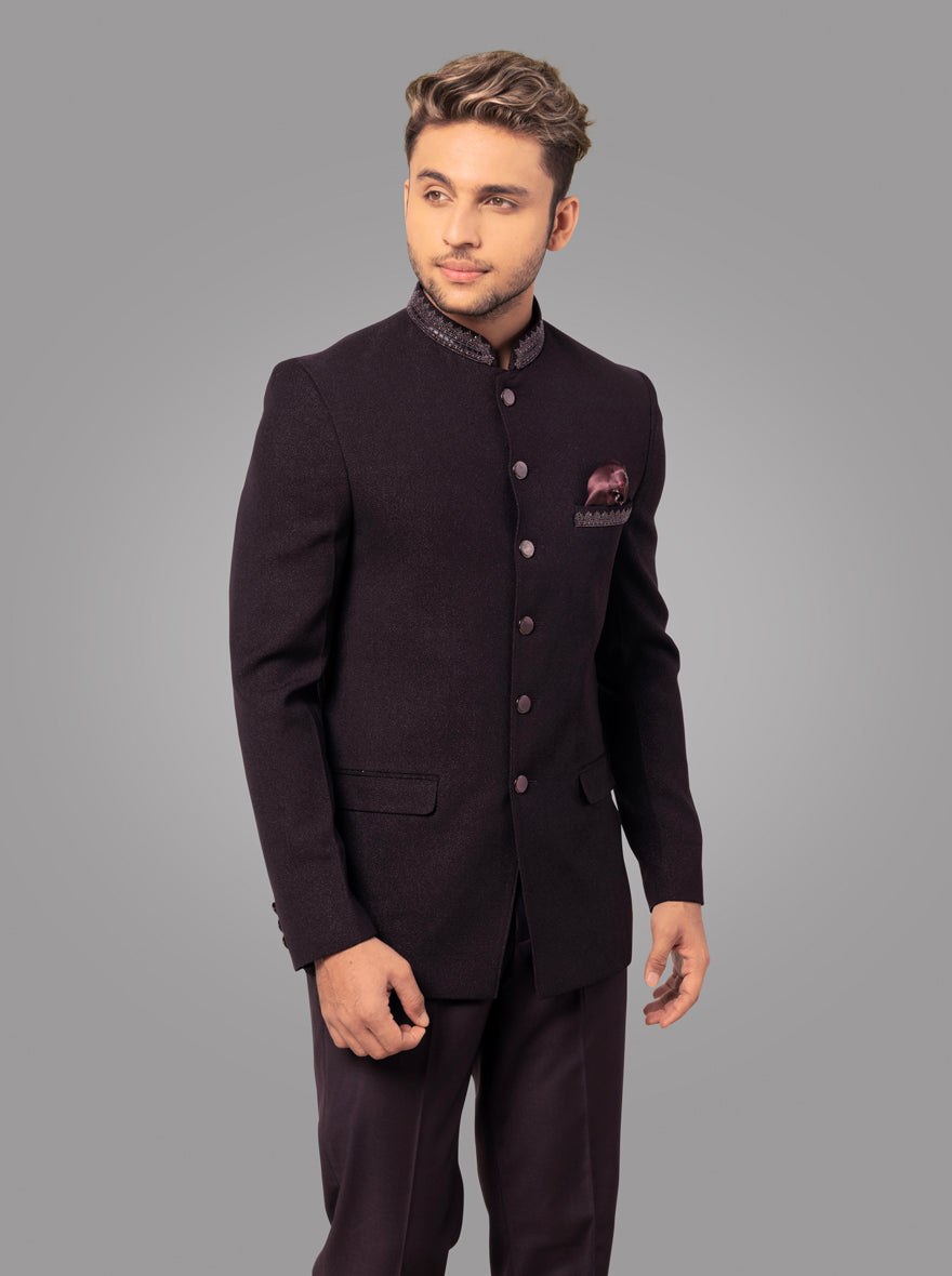 Stylish wine jodhpuri suit with self-textured fabric and embroidery details.