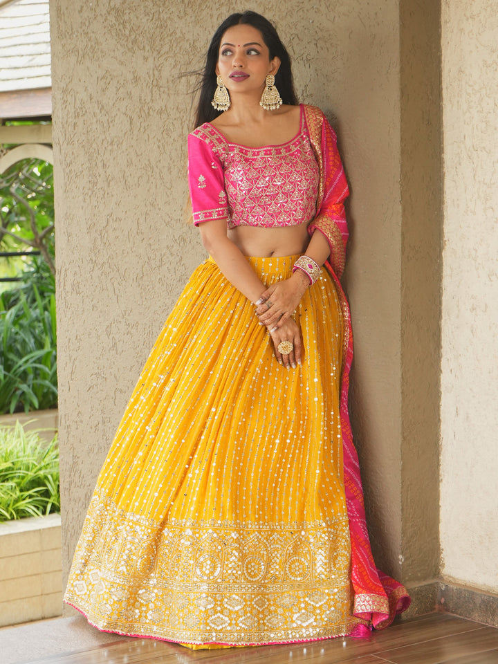 Glamorous Yellow Sequins Georgette Haldi Wear Lehenga Choli