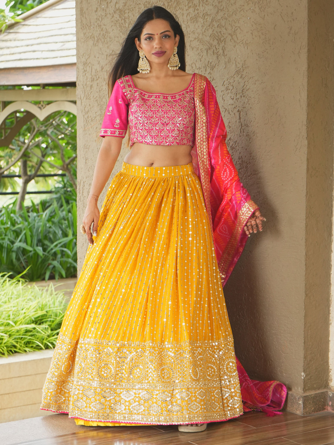 Glamorous Yellow Sequins Georgette Haldi Wear Lehenga Choli