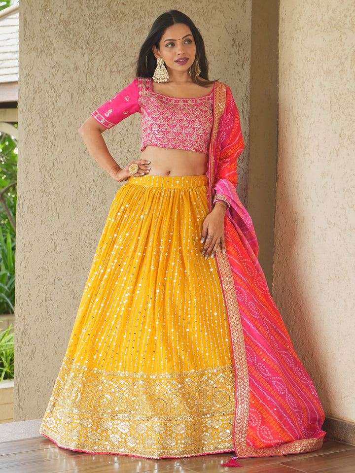 Glamorous Yellow Sequins Georgette Haldi Wear Lehenga Choli