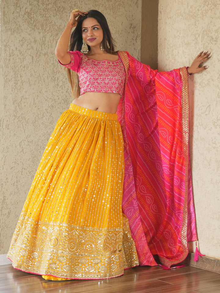 Glamorous Yellow Sequins Georgette Haldi Wear Lehenga Choli