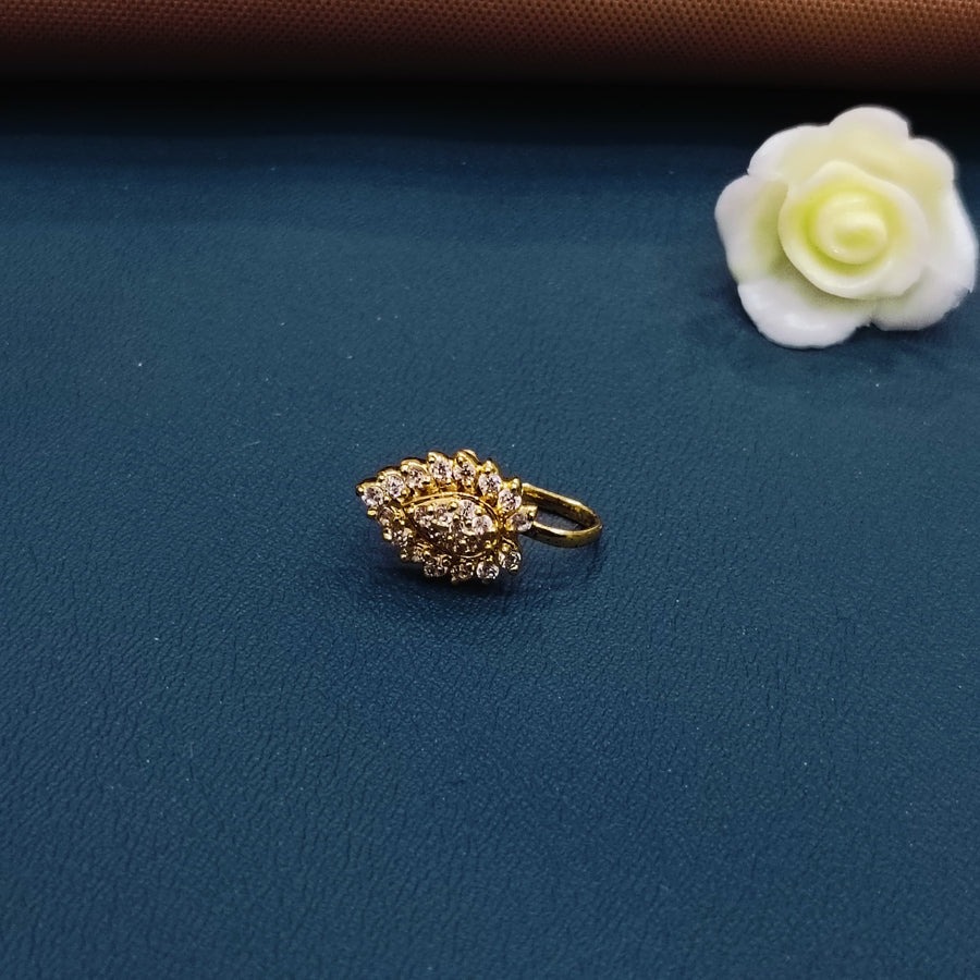 Chic golden nose ring featuring geometric shapes, perfect for modern outfits.