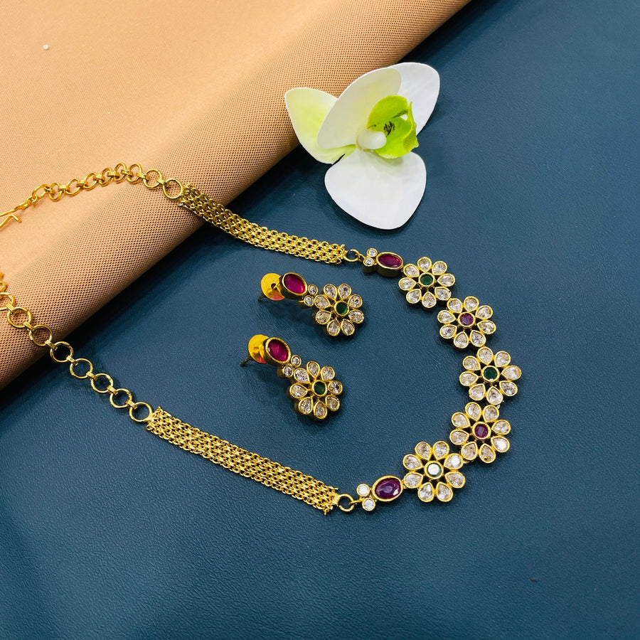 Traditional Indian choker in antique gold metal, a beautiful accessory for cultural celebrations.