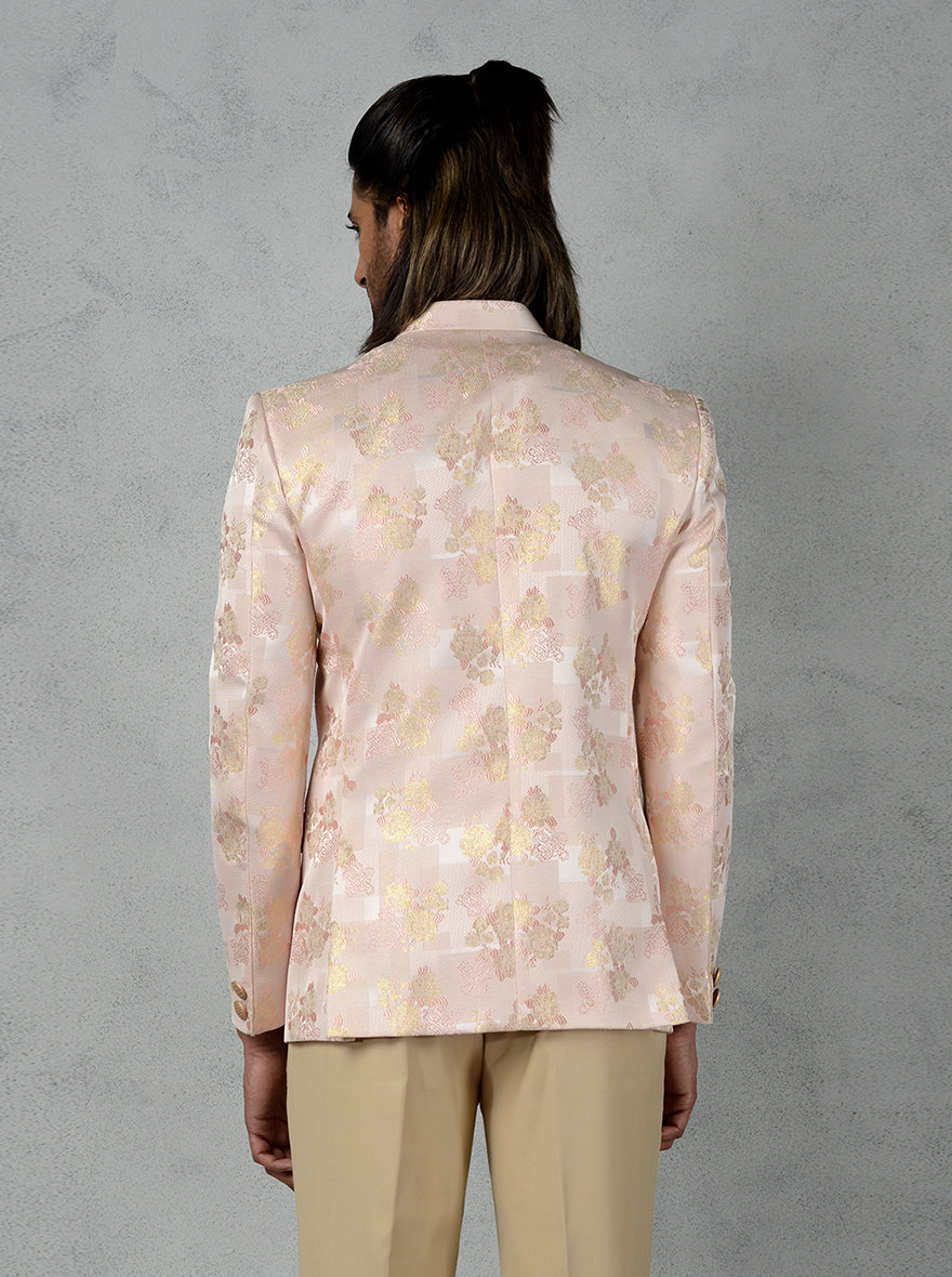Designer Peach Jodhpuri Suit with golden details and slim-fit trouser, perfect for men’s weddings.