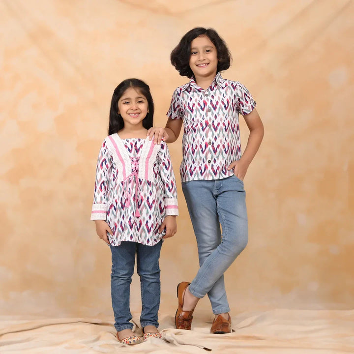 Purple Hues and Coordinated Views: White and Purple Ikkat Twin Set for Brother and Sister