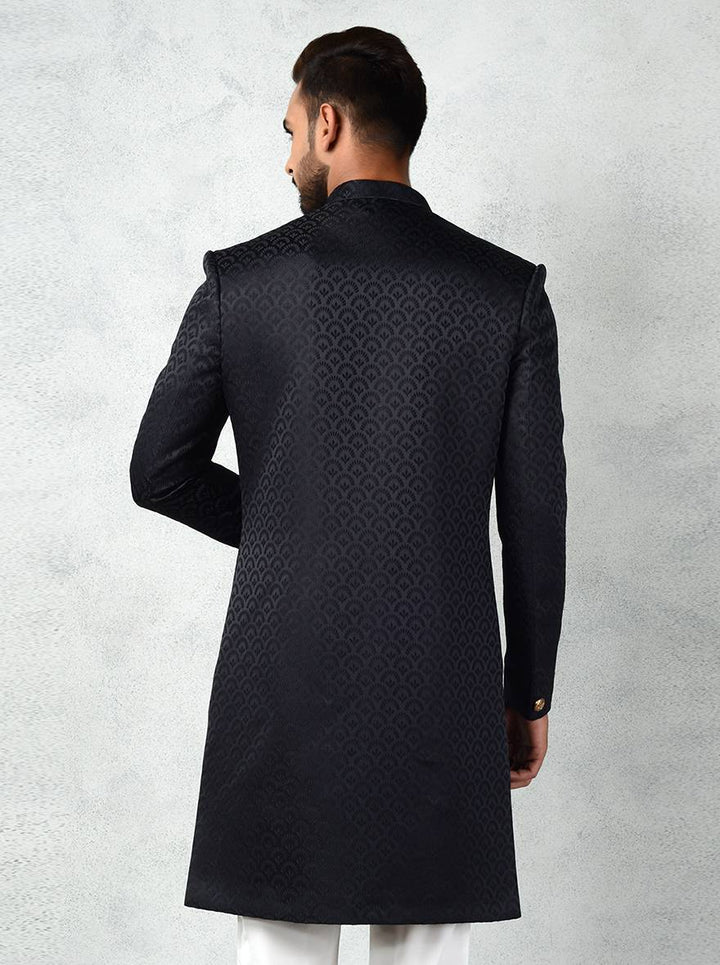 Black Indo-Western dress for men with royal gold buttons and pocket square.