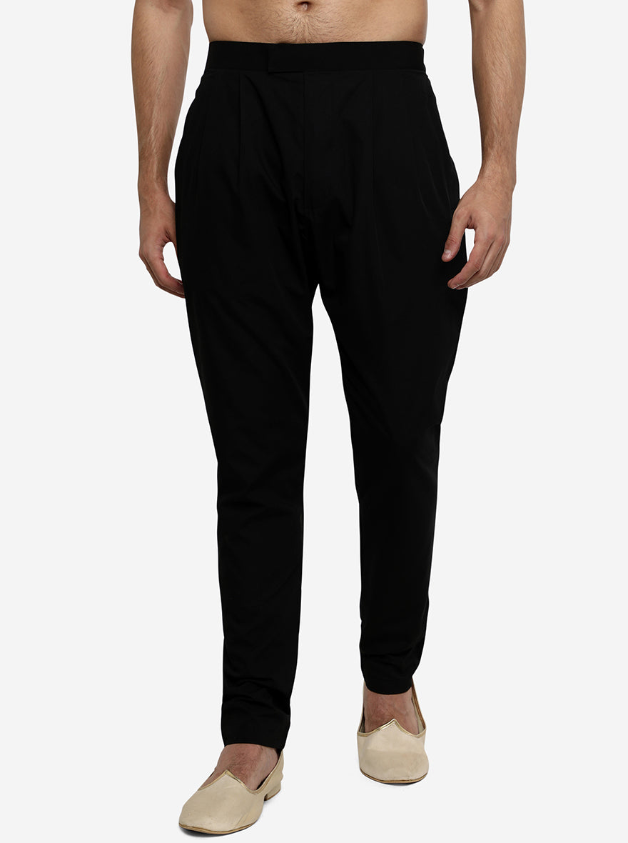 Pair our black Aligadhi pants with a white kurta for a stylish ensemble, ideal for any event.