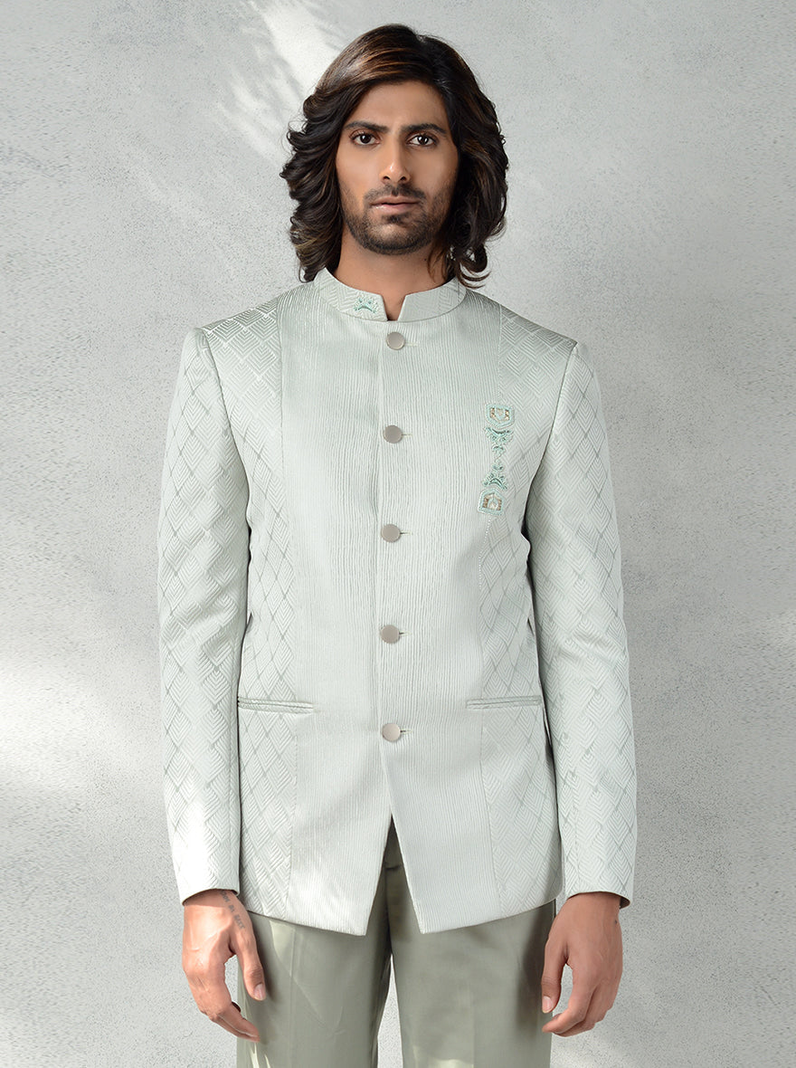 Pista Green Jodhpuri Suit for men with jacquard design and hand embroidery.