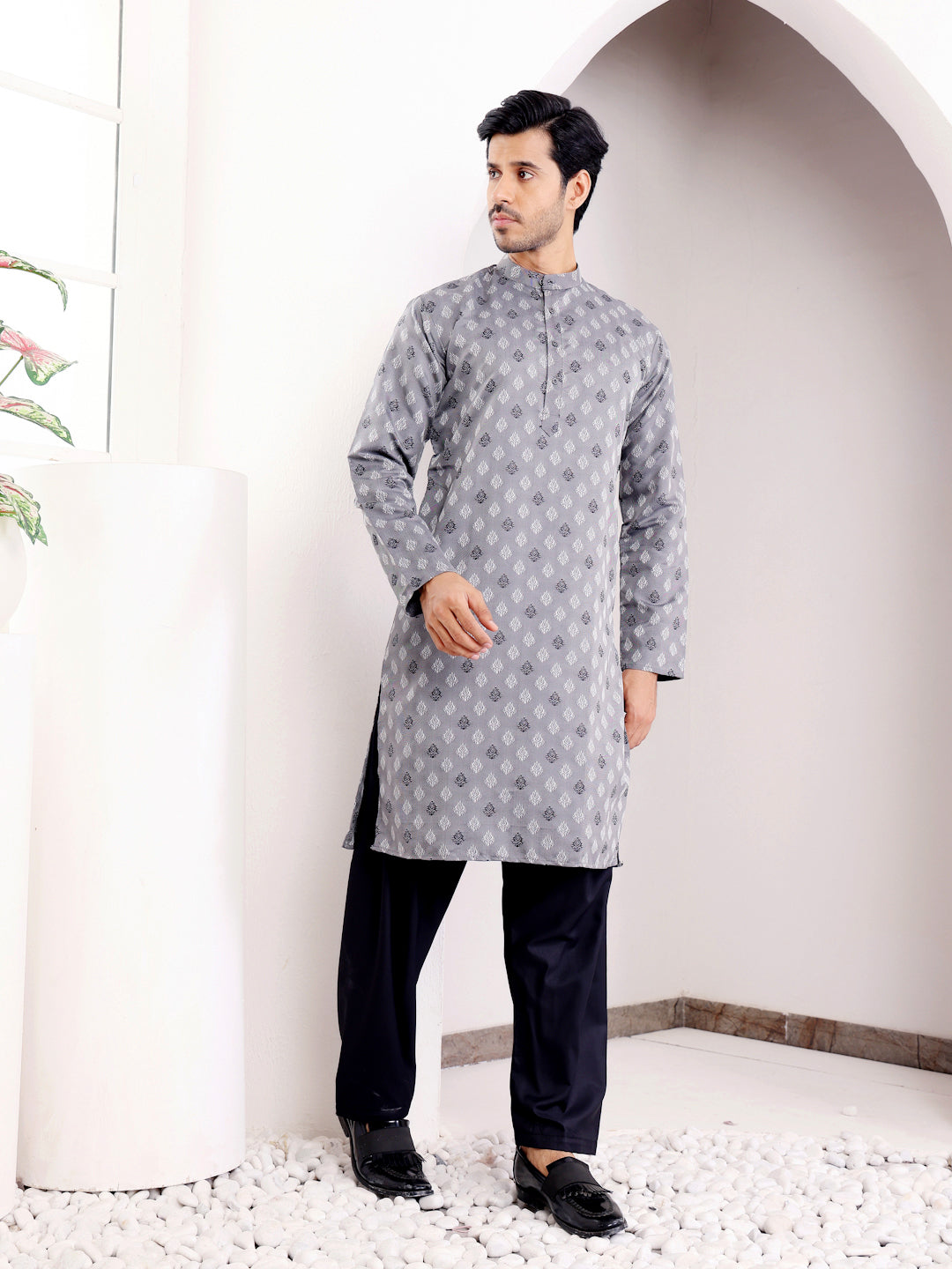 Modern gray kurta with intricate motifs and a stylish, comfortable fit for any gathering.