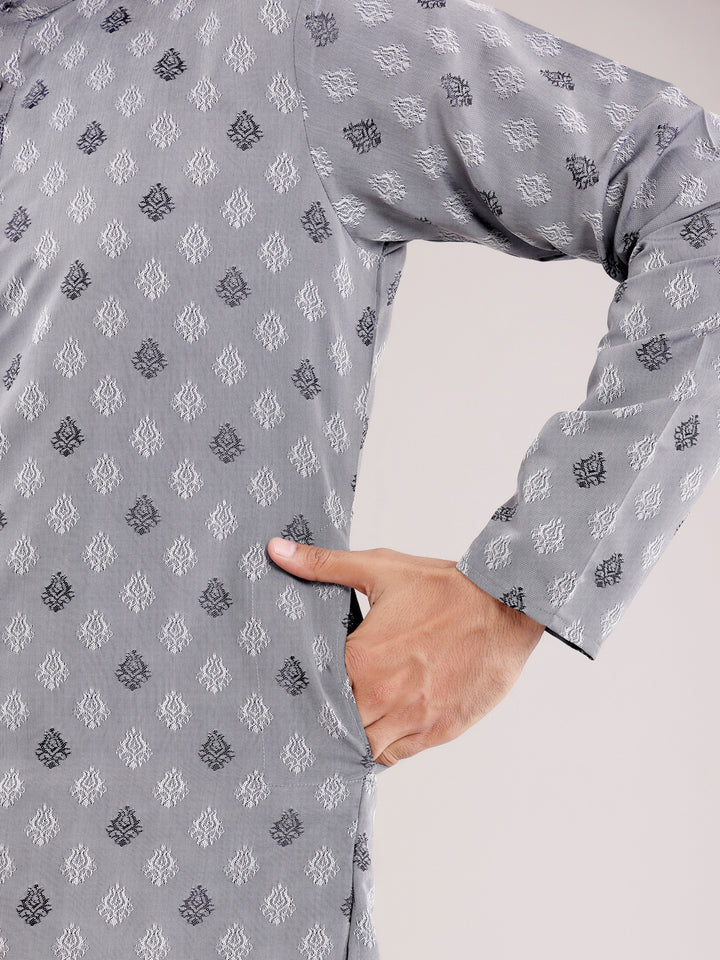 Classic gray kurta with fine handwoven detailing, perfect for a cultural celebration.