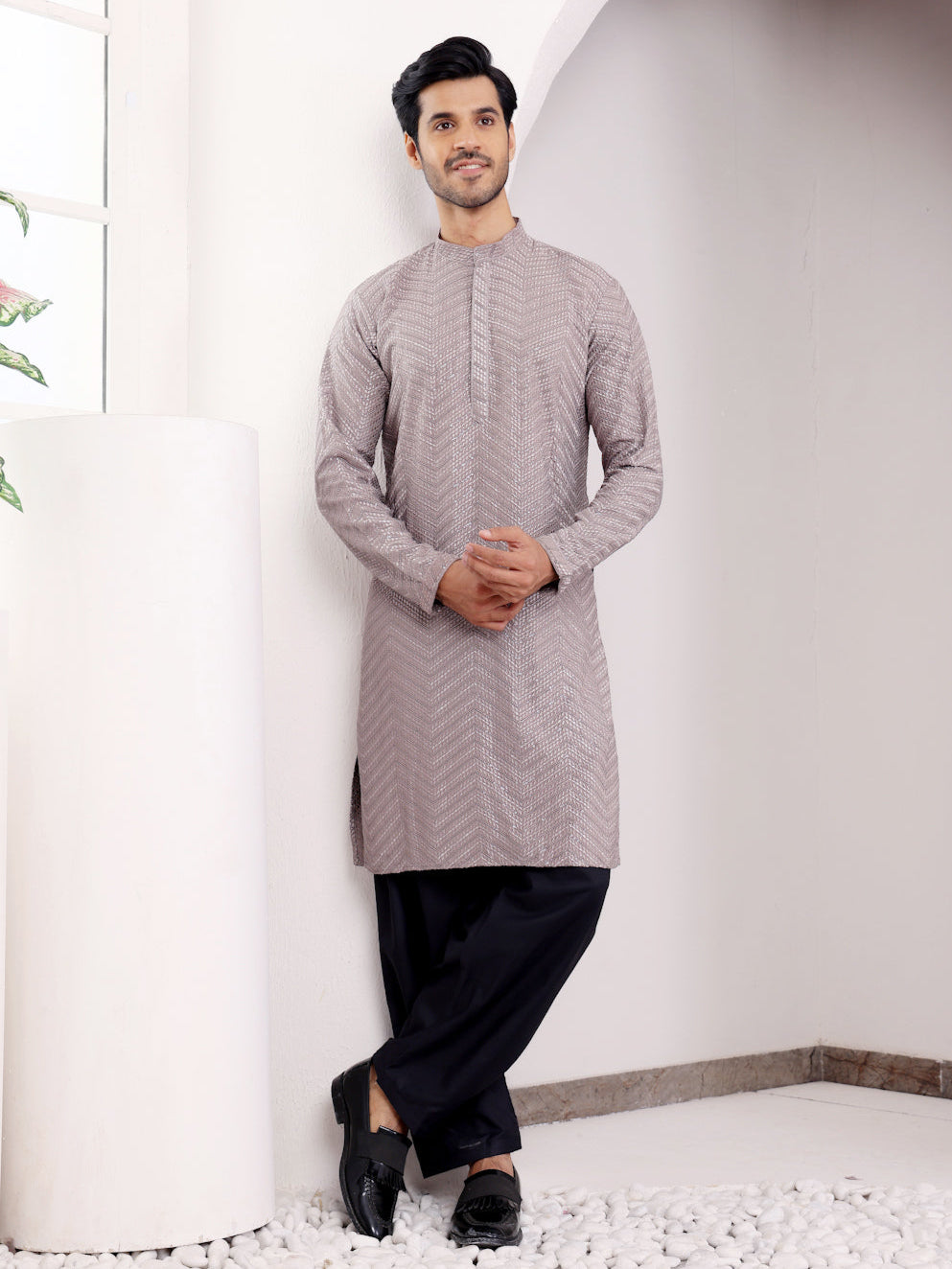 Dark grey kurta set for men with handwoven motifs and Chikankari embroidery, ideal for festive occasions.