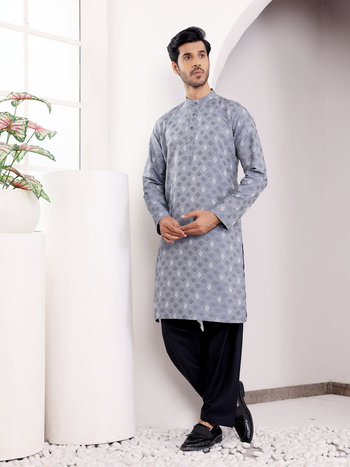 Light blue kurta featuring fine handwoven patterns, perfect for festive or casual events.