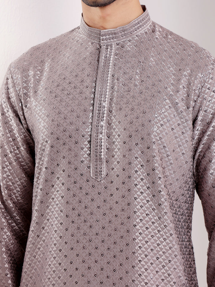 Sophisticated dark grey kurta with Chikankari and art silk bottoms for a stylish look.