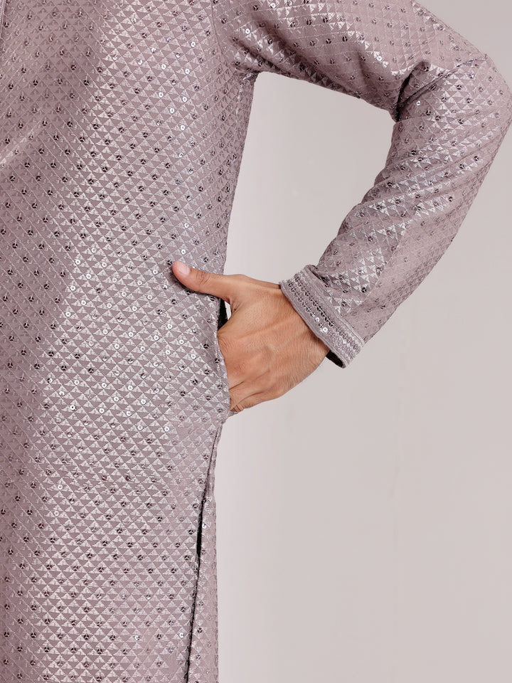 Comfortable dark grey kurta set with Chikankari work, perfect for any celebration.