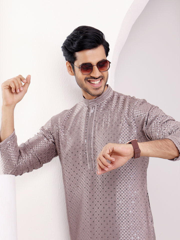 Men’s dark grey kurta with Chikankari and embroidery detailing, perfect for formal events.