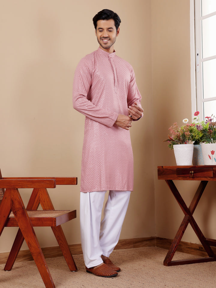 Timeless onion pink kurta set with handwoven Chikankari embroidery and art silk bottoms for men.