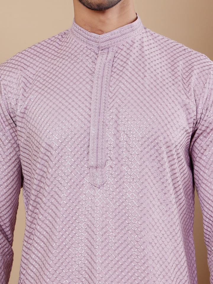 Timeless lavender kurta for men featuring detailed Chikankari embroidery and soft art silk bottoms.
