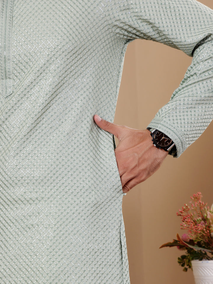 Light pastel green kurta set with Chikankari work and stylish art silk bottoms, ideal for any occasion.