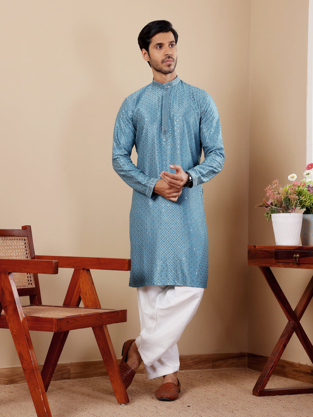 Stylish cyan blue kurta with Chikankari work, ideal for family gatherings.