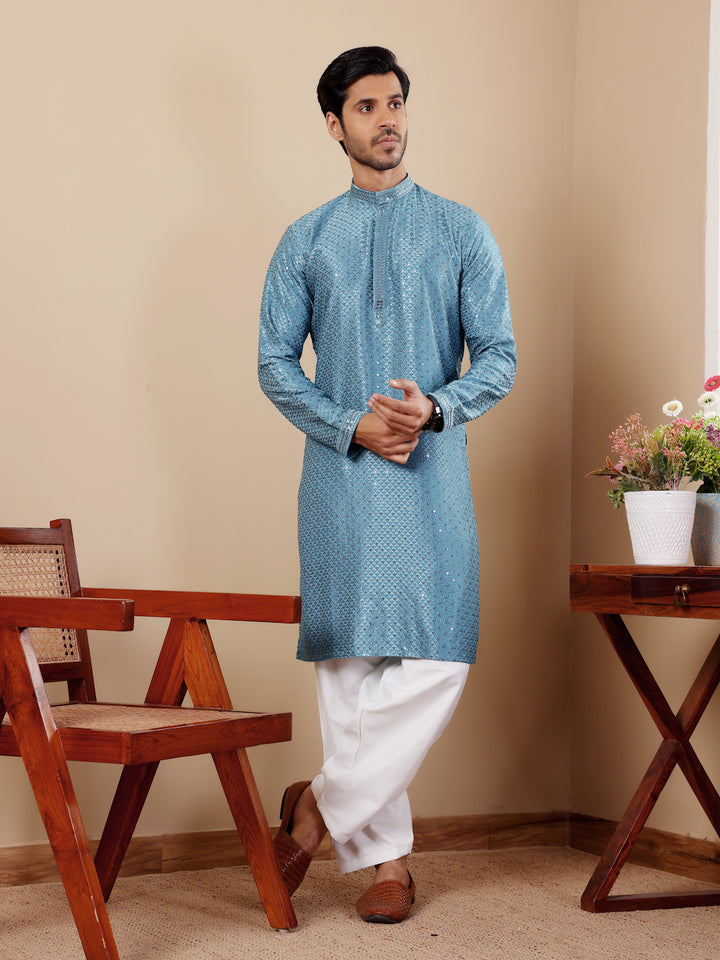 Stylish cyan blue kurta with Chikankari work, ideal for family gatherings.