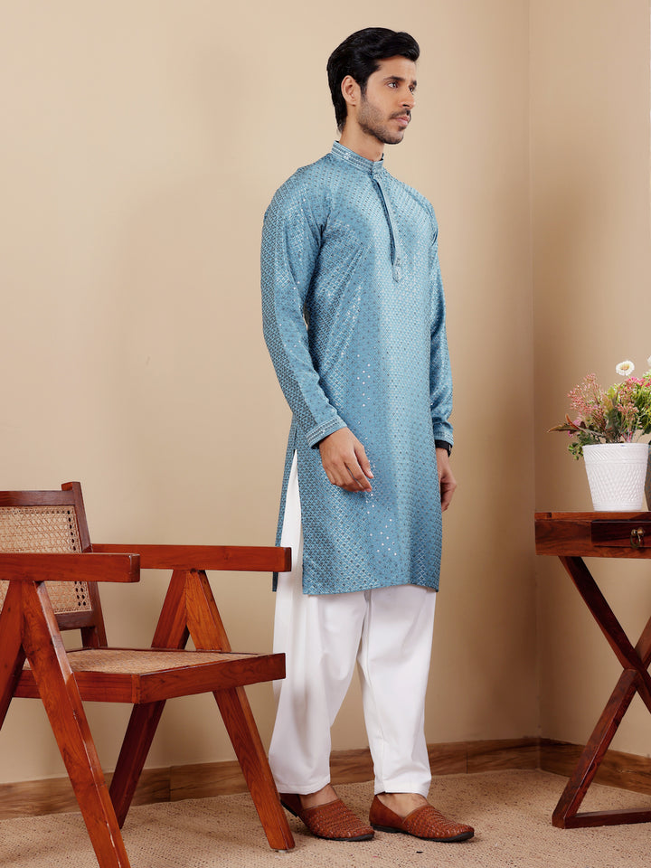 Cyan blue kurta set for men with art silk bottoms, featuring intricate embroidery.