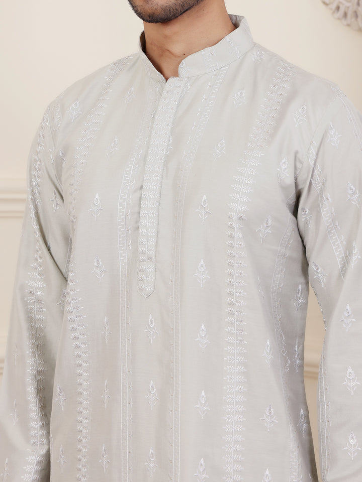 Handcrafted light green kurta set for men featuring exquisite design and breathable fabric.