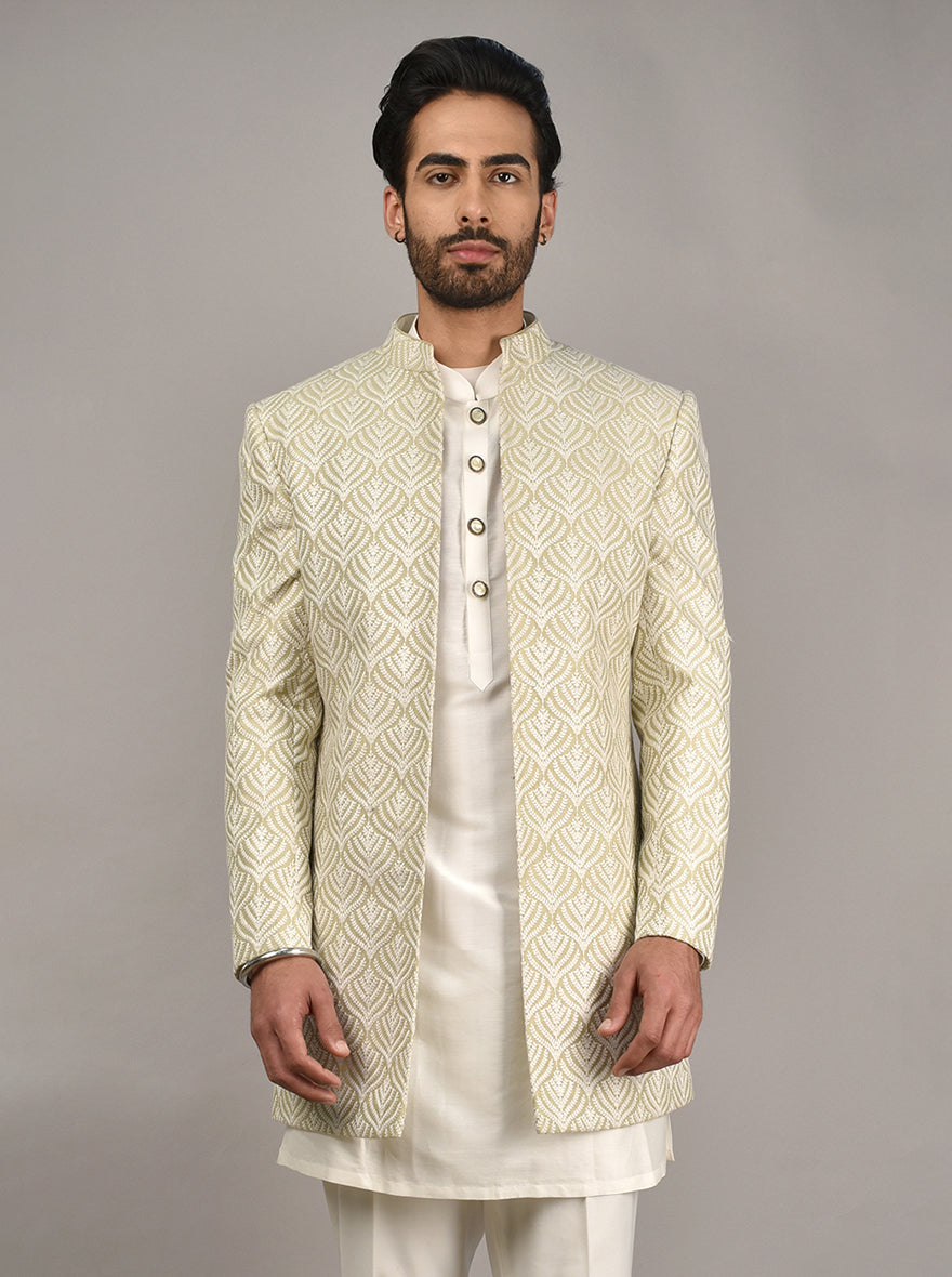 Mehndi green jodhpuri suit with silk fabric and embroidery.