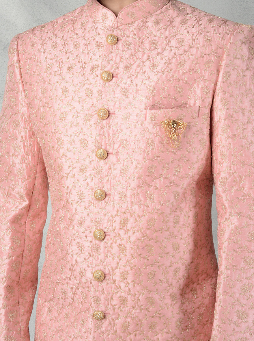 Groom's pink Indo-Western dress with gold embroidery, mandarin collar, and silk blend fabric.