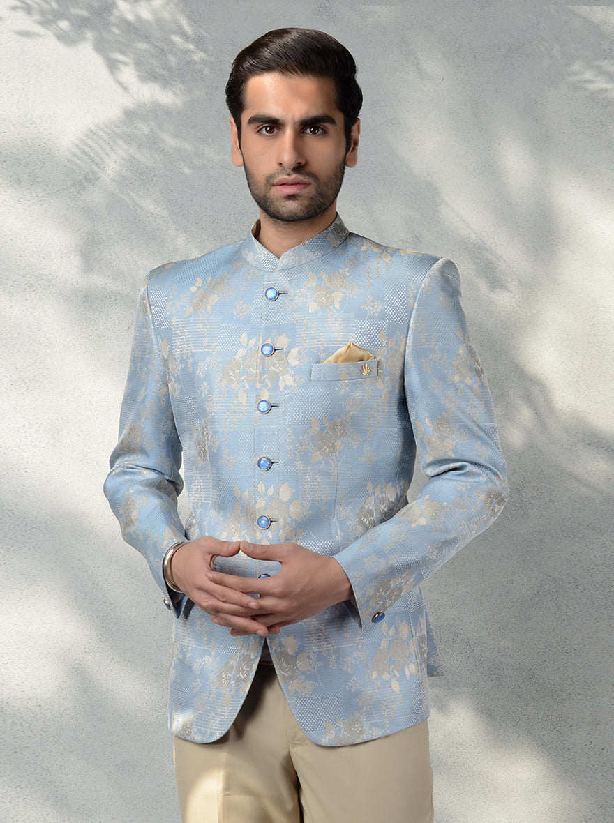 Elegant jodhpuri suit in pastel blue with floral motifs for weddings.