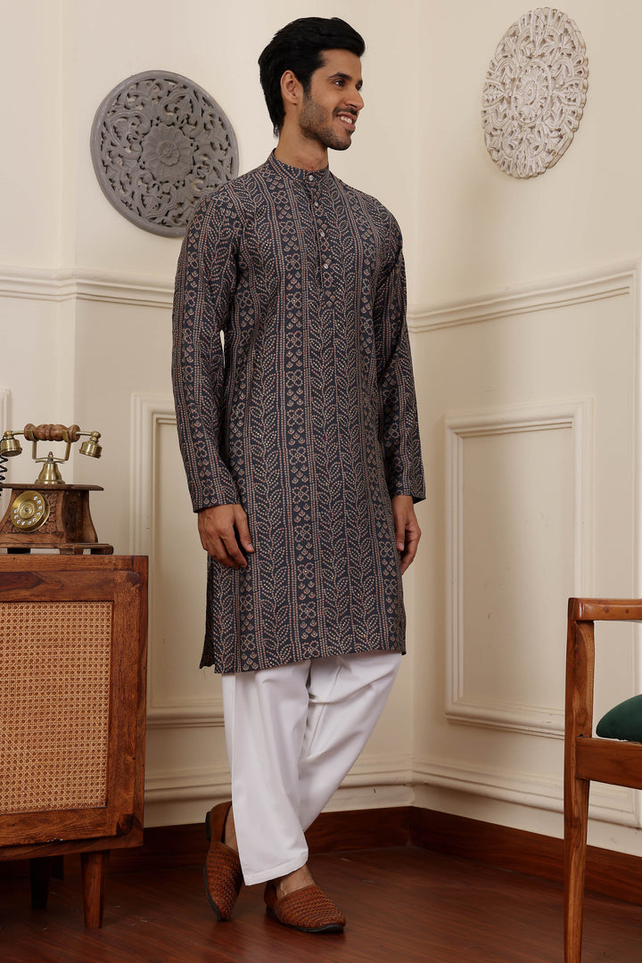 Embroidered navy blue kurta pajama set in premium modal silk fabric
