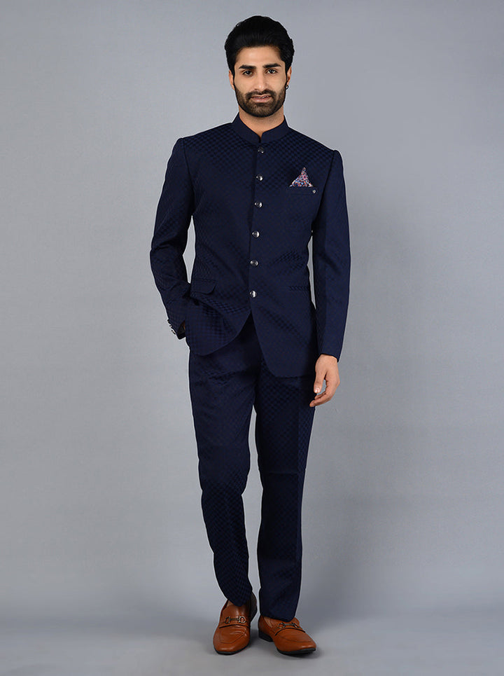 Stylish blue jodhpuri suit with mandarin collar and full sleeves.