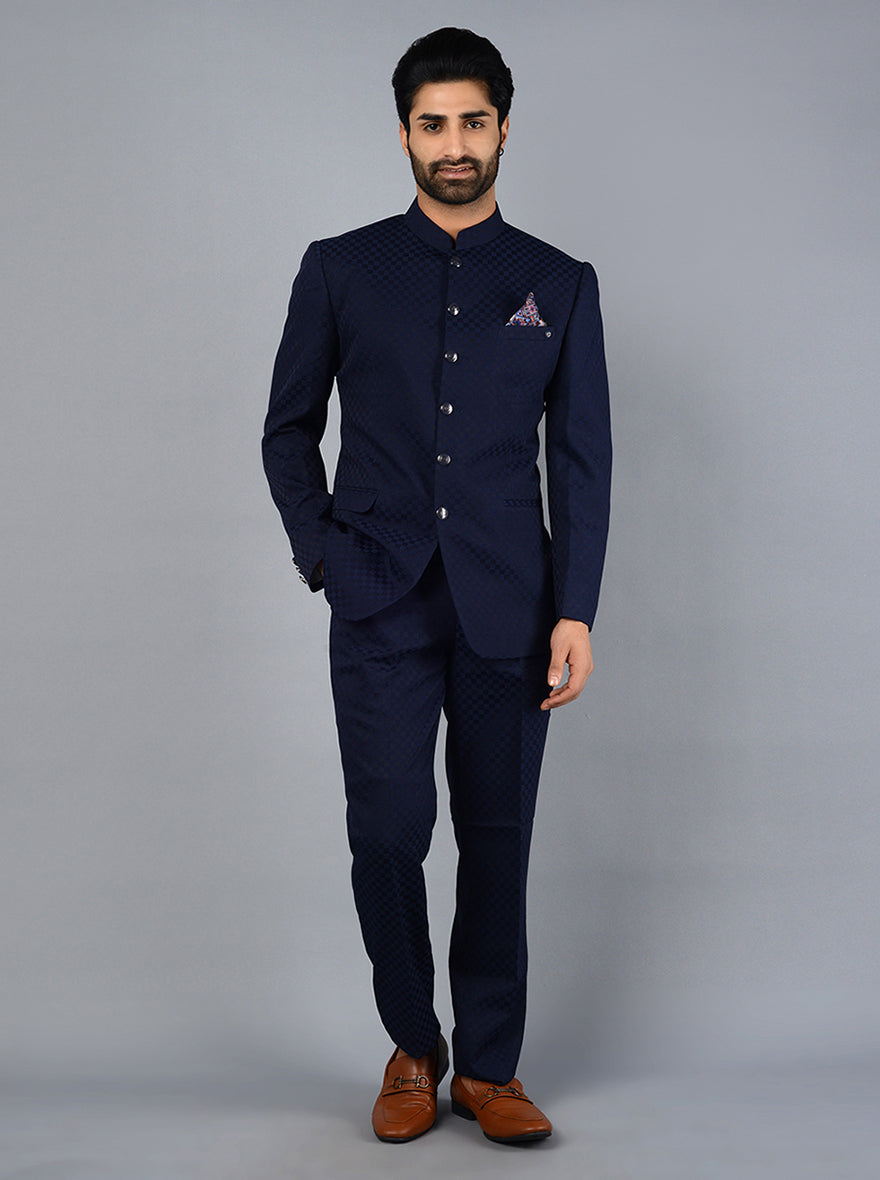 Stylish blue jodhpuri suit with mandarin collar and full sleeves.