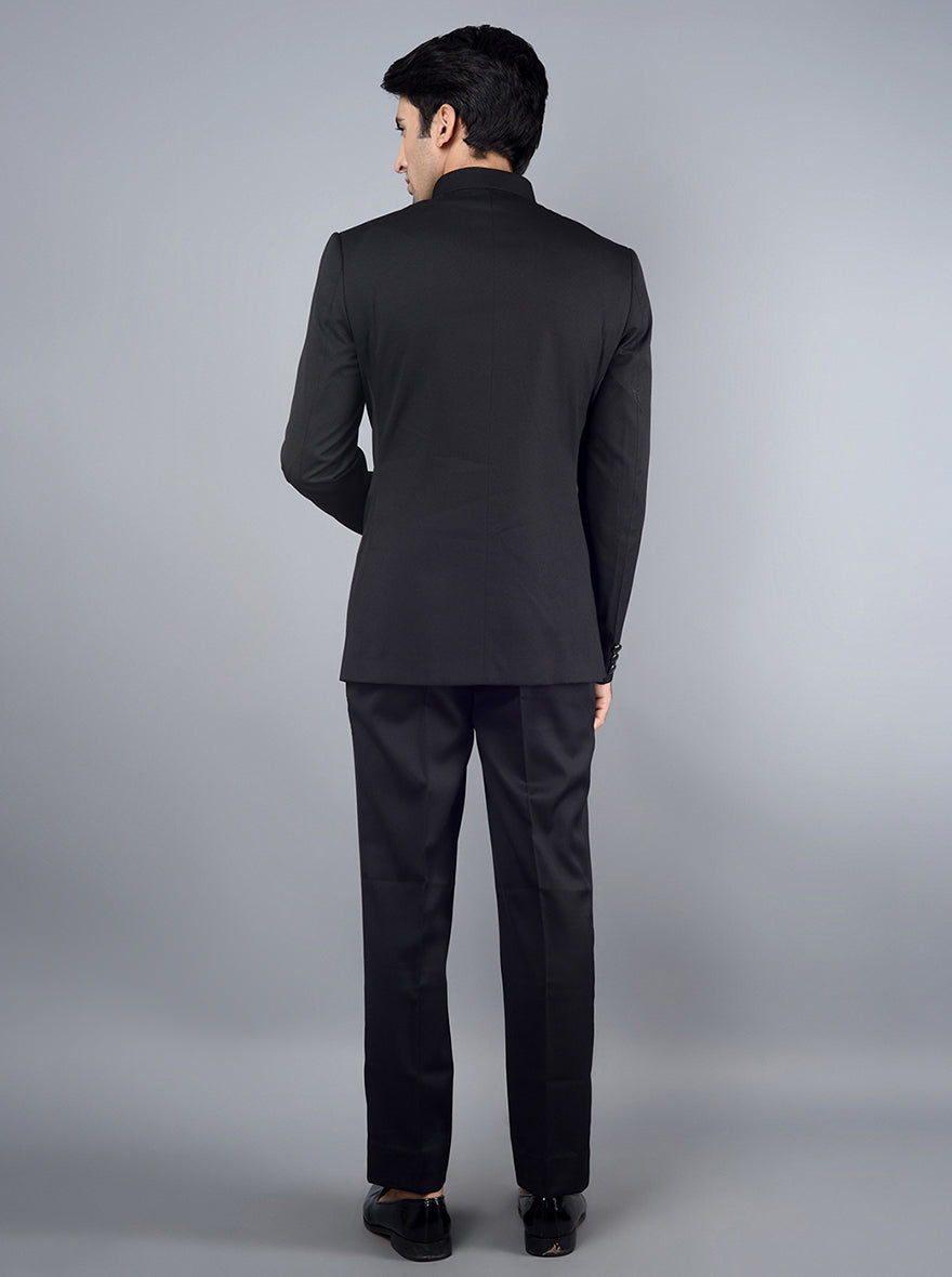 Elegant black jodhpuri suit with a sleek and modern cut for men.