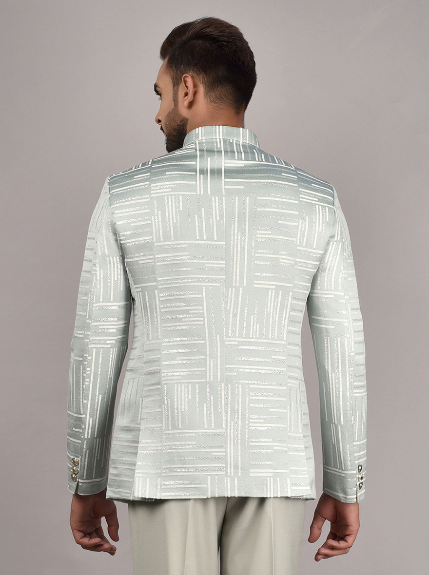 Stylish Pista & Cream Jodhpuri Suit with silver buttons and premium jacquard fabric.